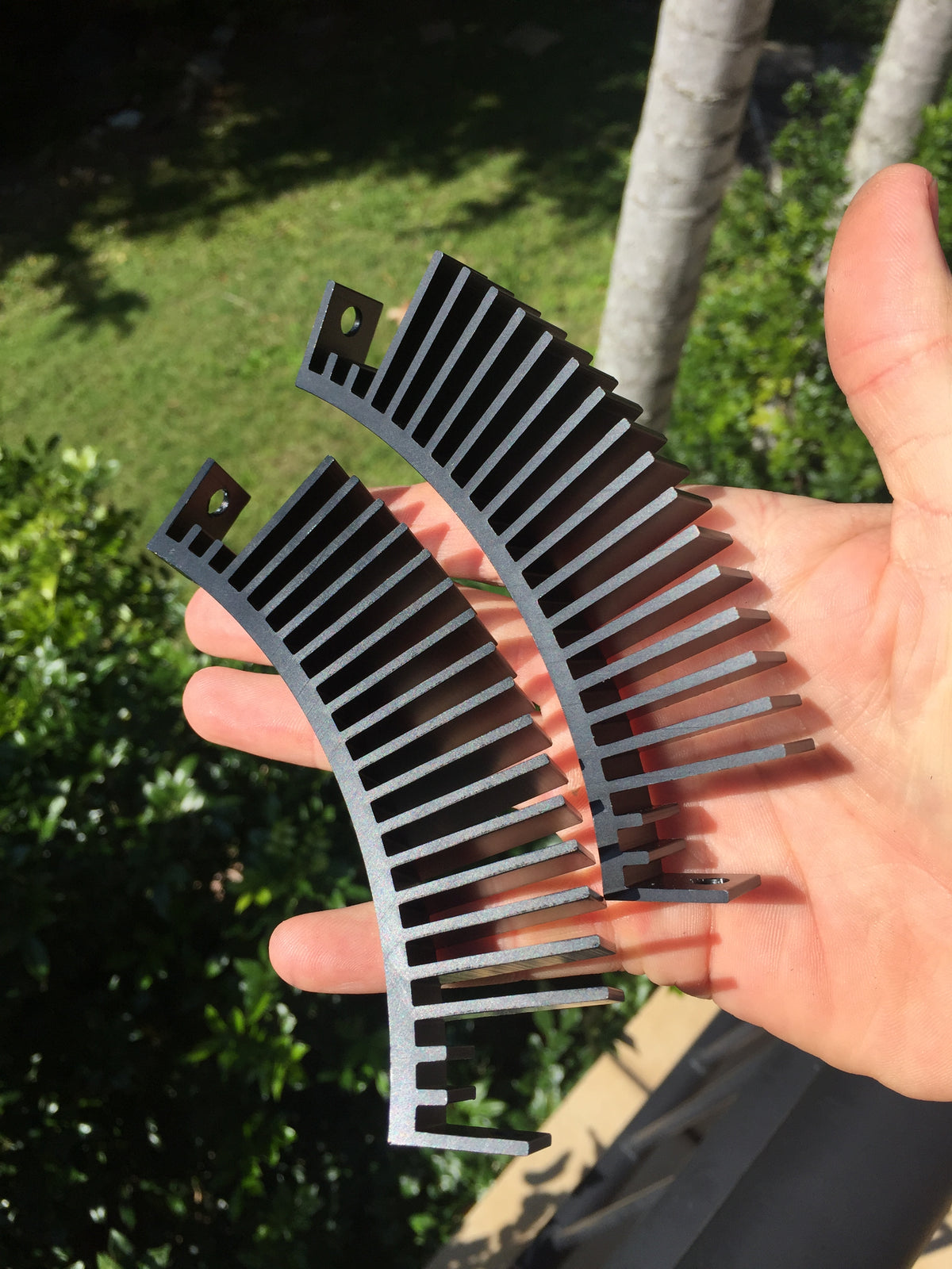 HubSink heat sink segment held in hand showing fin size